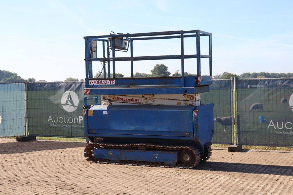 Scissor Lift Holland Lift Y-70DL12-TR Electric+Diesel 9m 2004