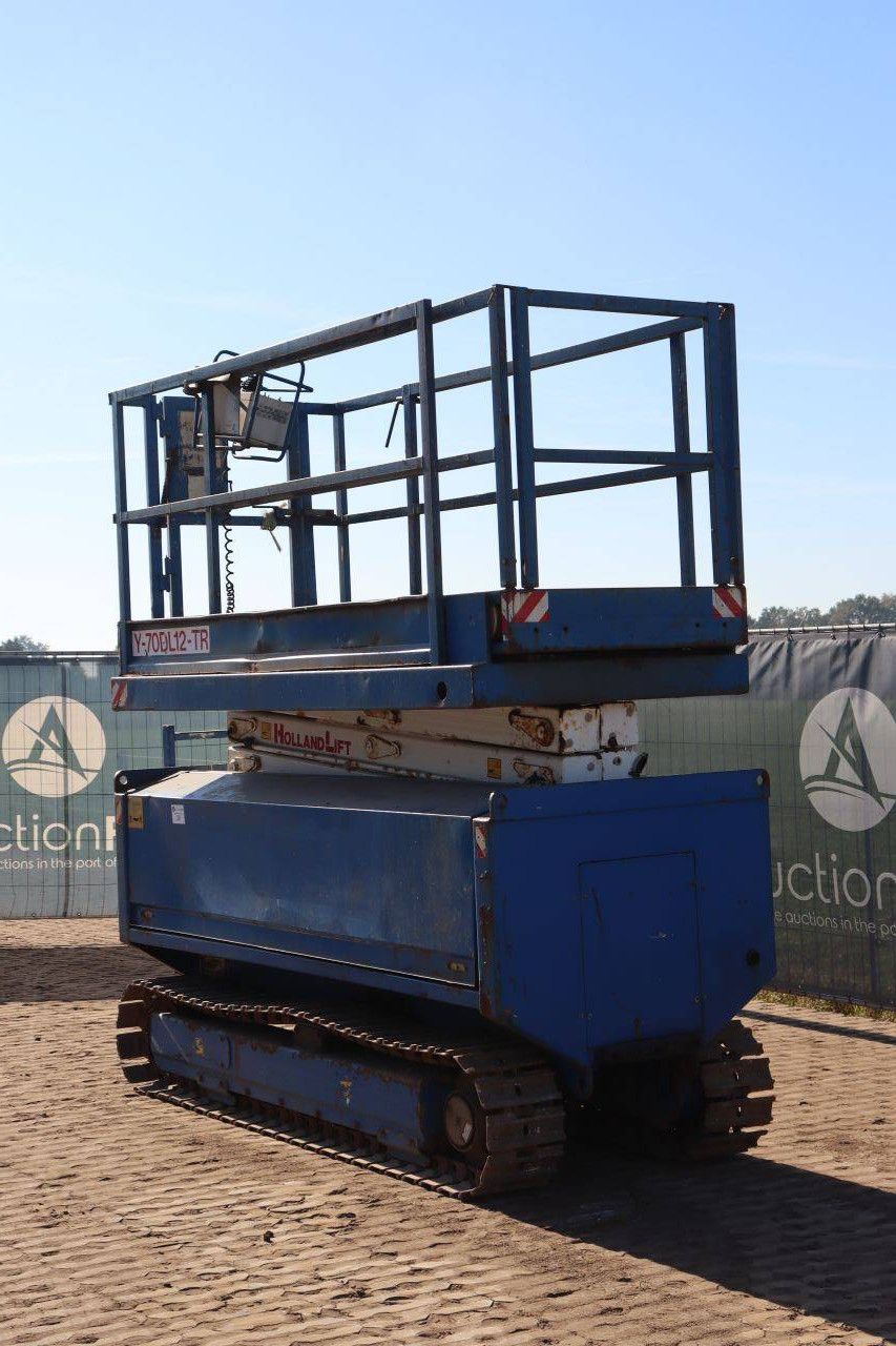 Scissor Lift Holland Lift Y-70DL12-TR Electric+Diesel 9m 2004
