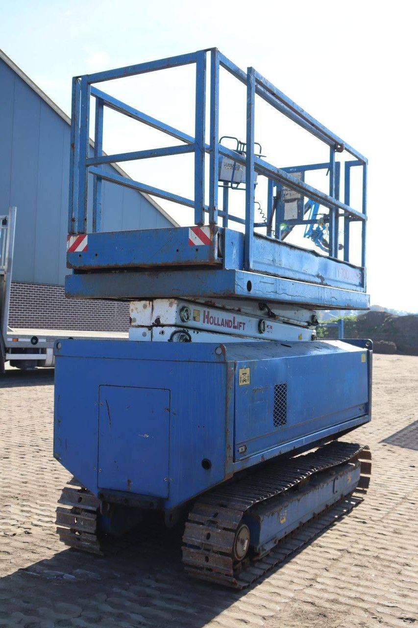 Scissor Lift Holland Lift Y-70DL12-TR Electric+Diesel 9m 2004