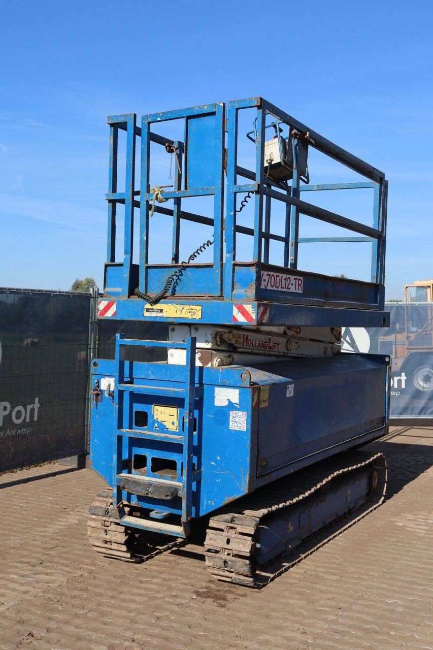 Scissor Lift Holland Lift Y-70DL12-TR Electric+Diesel 9m 2004