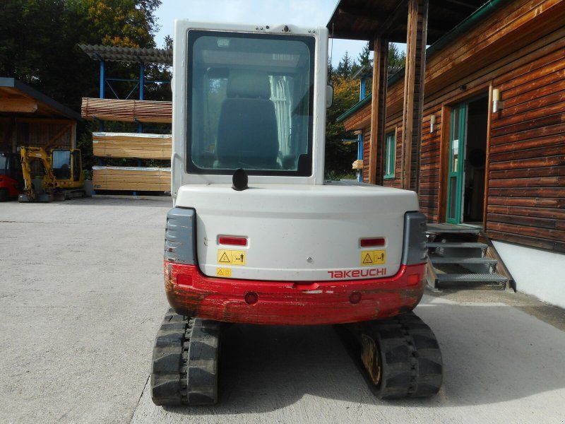 Takeuchi TB 250 ( 4.965kg ) POWERTILT hydr. SW 3 Löffel
