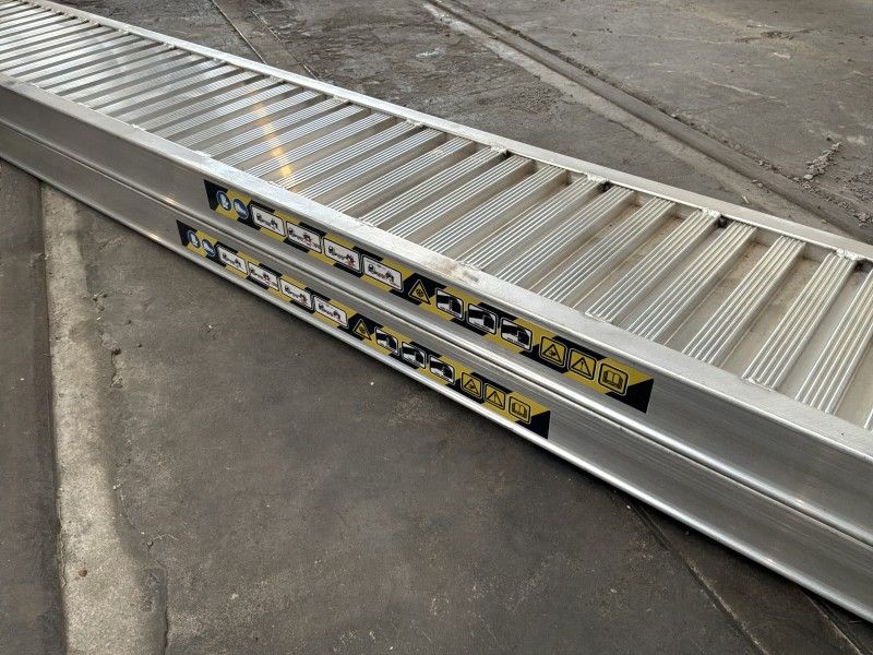 Aluminum ramps (unused) (2)