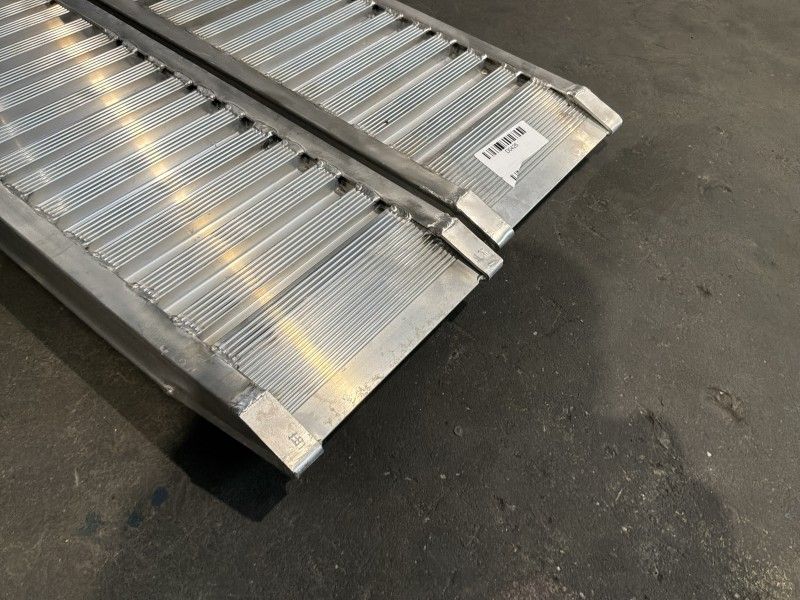 Aluminum ramps (unused) (2)