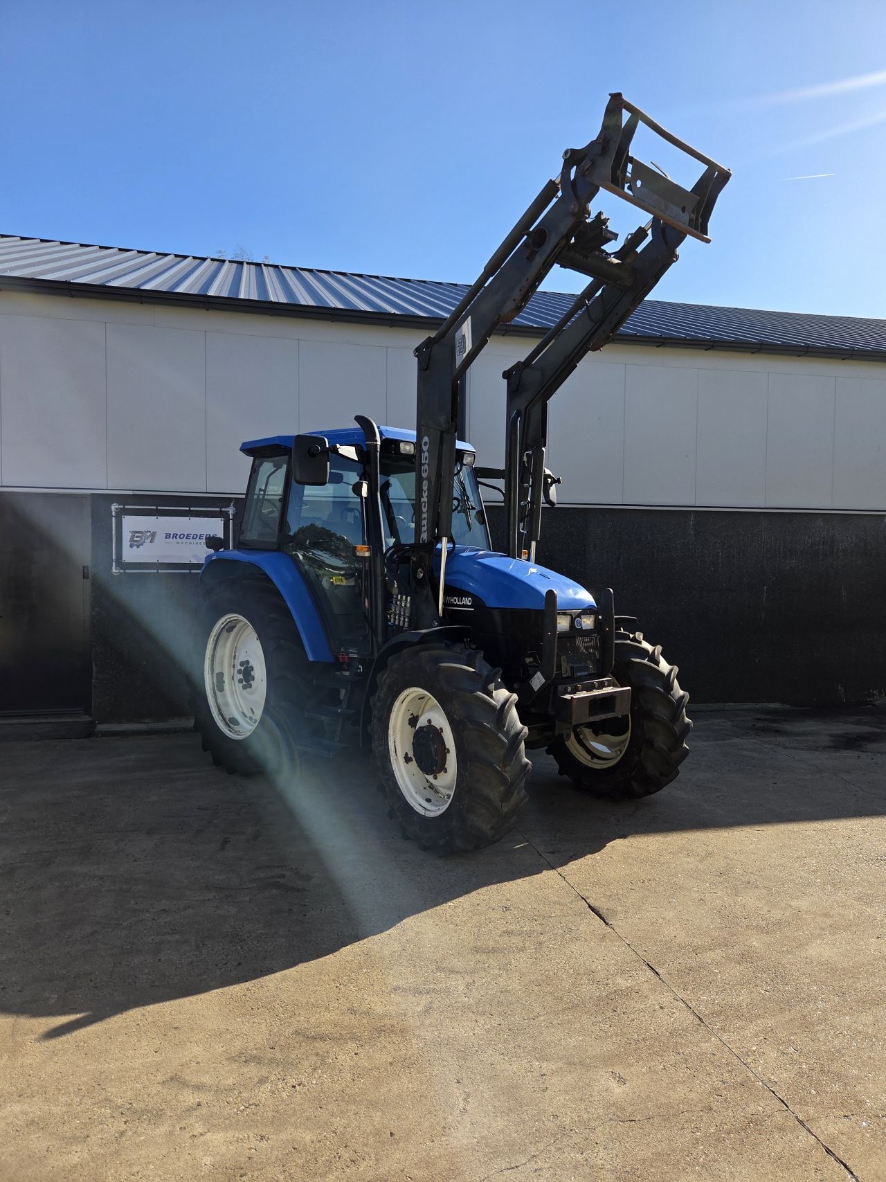 New Holland TS 90 SLE 4WD met voorlader