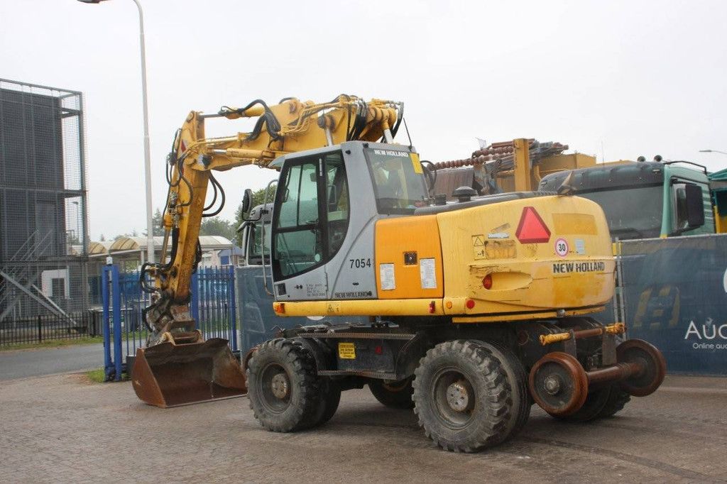 Wheel excavator New Holland MH5 Plus Diesel 2008