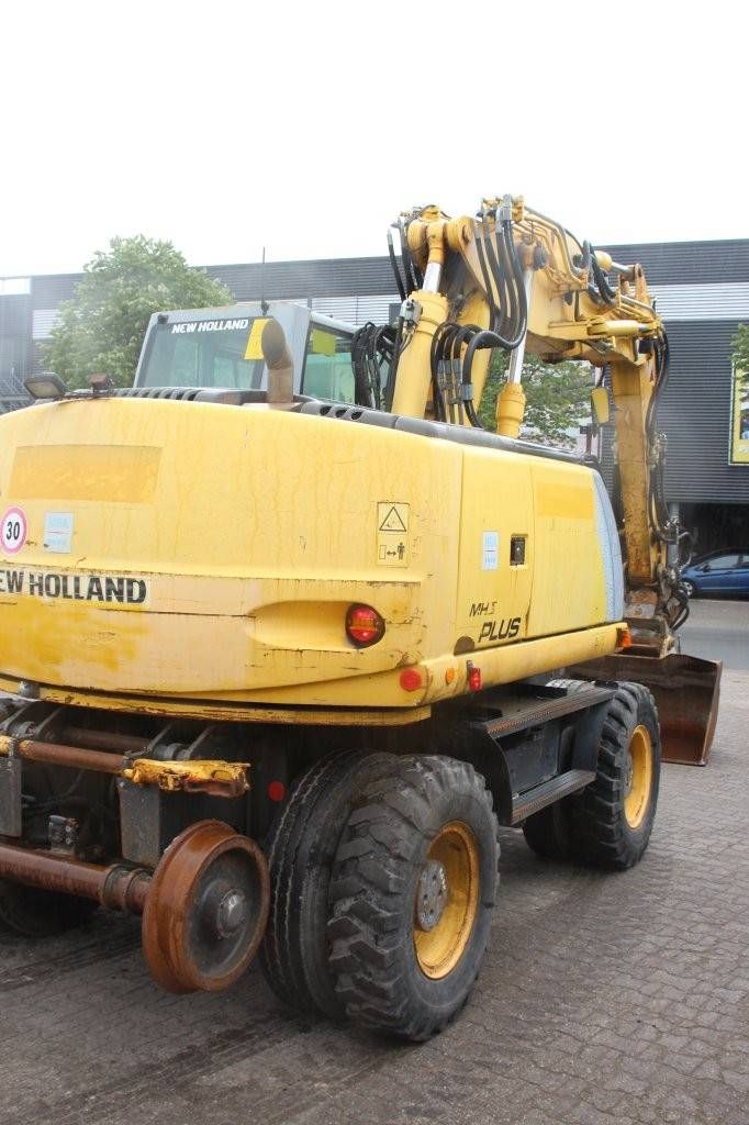 Wheel excavator New Holland MH5 Plus Diesel 2008
