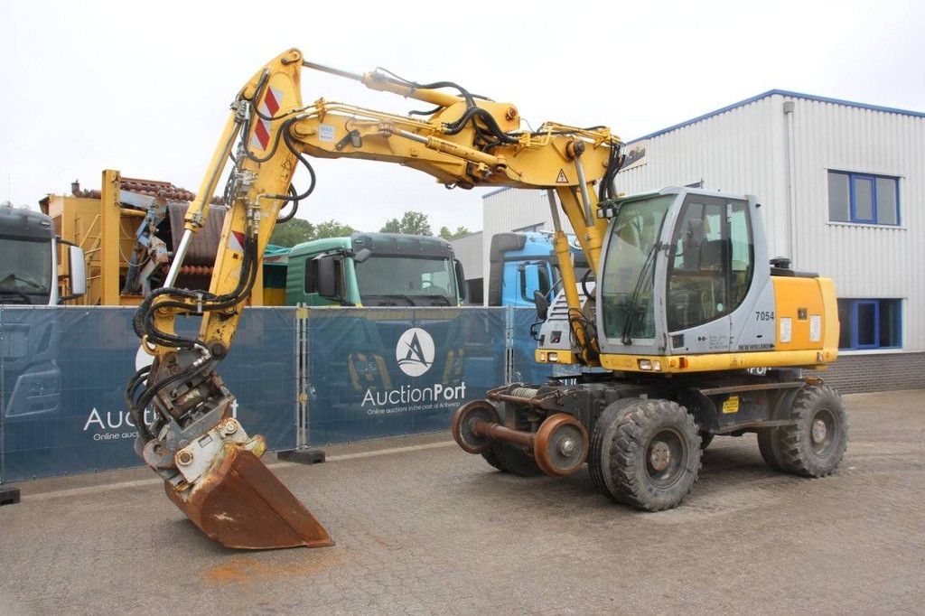 Wheel excavator New Holland MH5 Plus Diesel 2008
