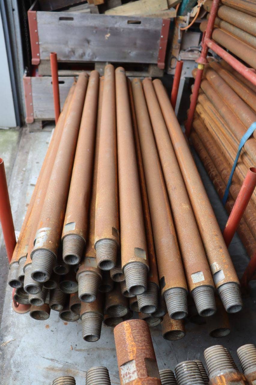 Lot of various drill rods