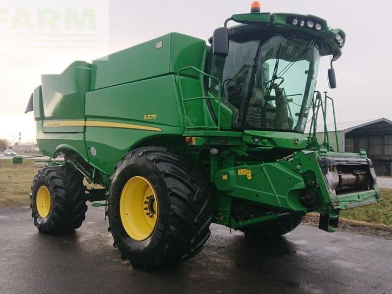 John Deere s670 4wd + macdon fd75