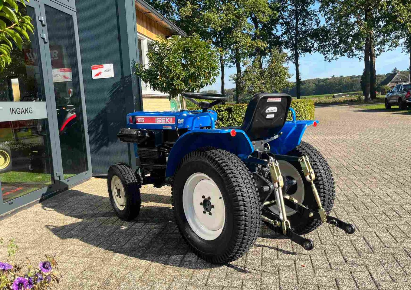 Marge Iseki TX 155 met gazonbanden
