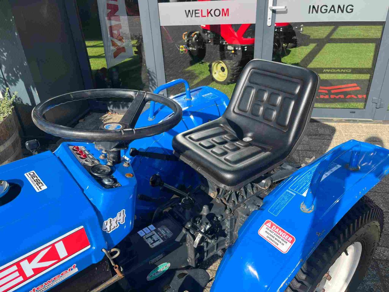 Marge Iseki TX 155 met gazonbanden