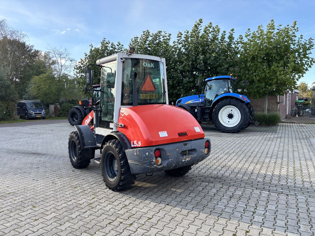 O&K L5.5 Shovel met Bak en Palletbord.