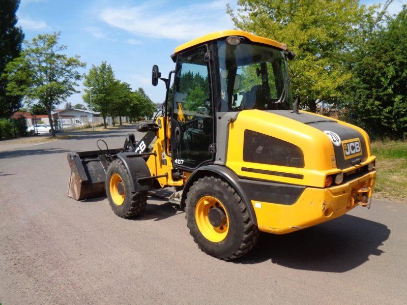 JCB 407 T4  Klappschaufel + Gabel