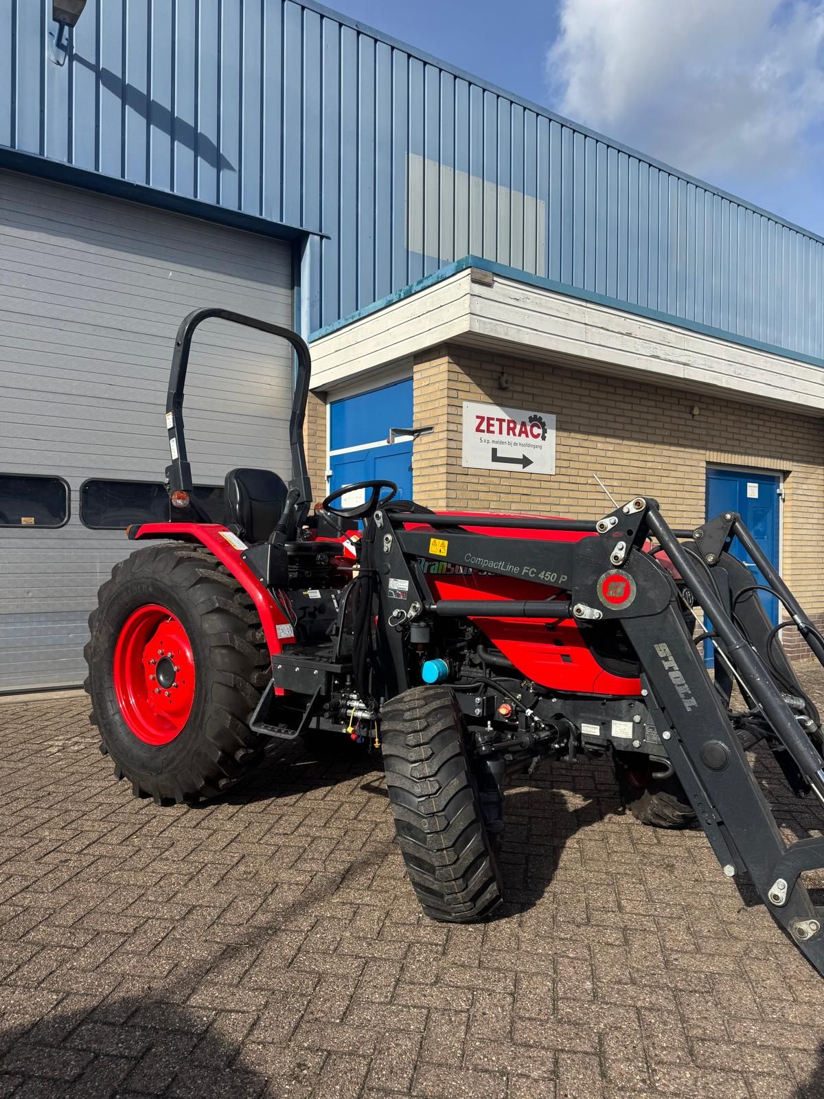 Branson 5025 Hydrostaat met Stoll voorlader