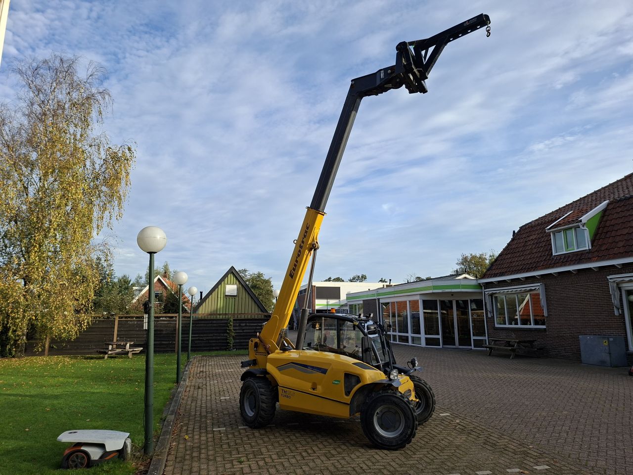 Eurotrac TH25.6 verreiker - Incl. jip, bak en palletvork