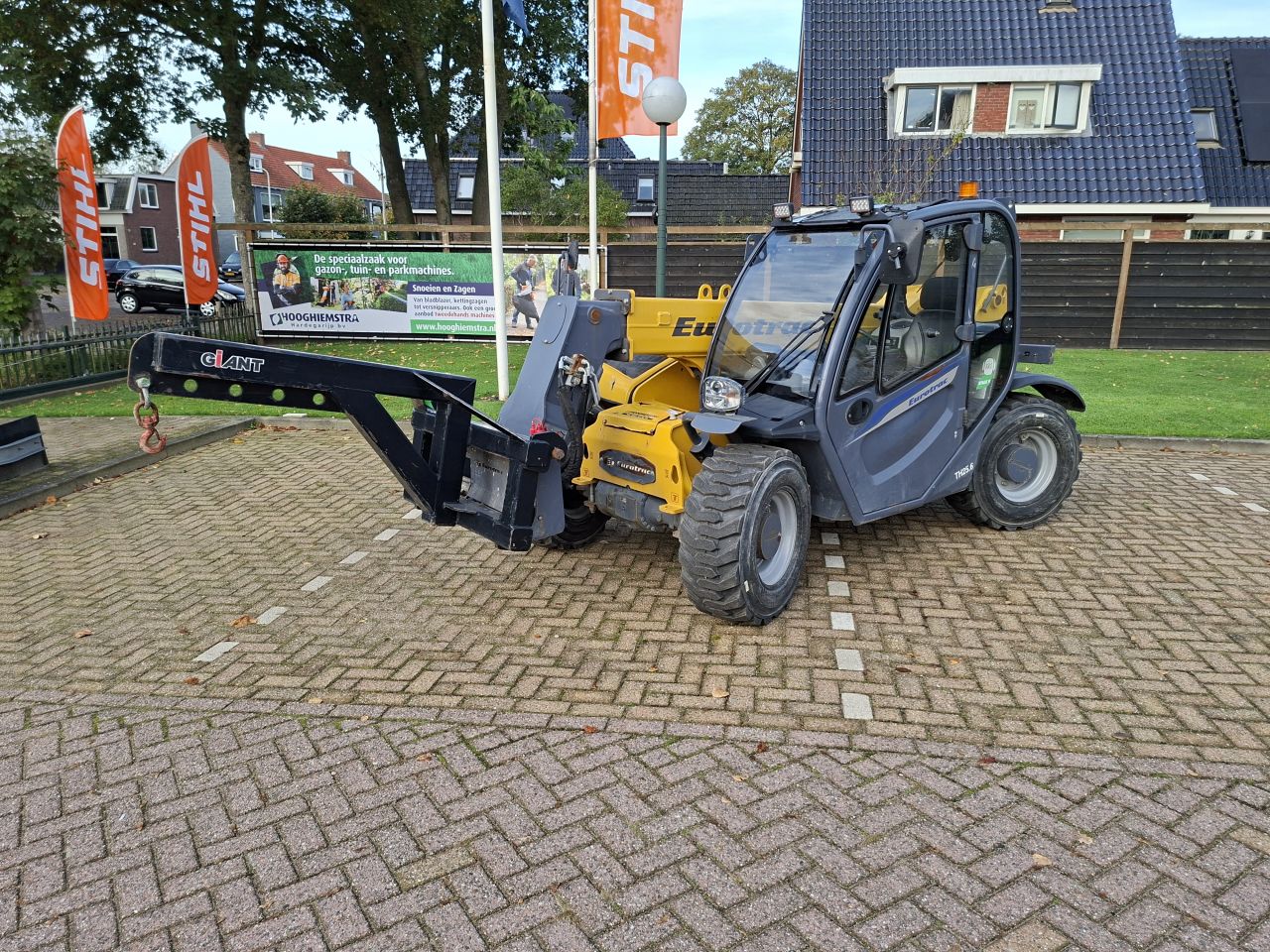 Eurotrac TH25.6 verreiker - Incl. jip, bak en palletvork