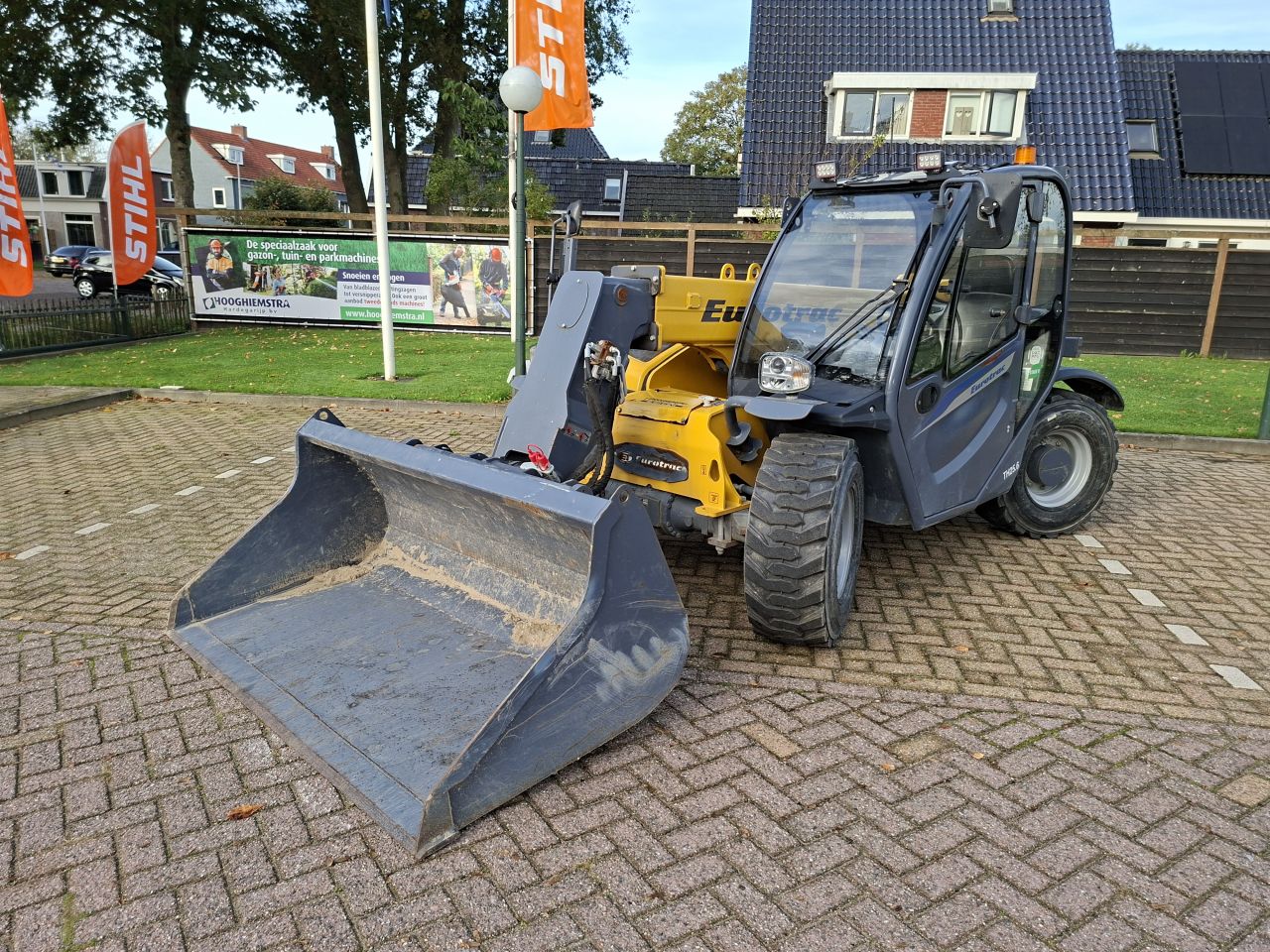 Eurotrac TH25.6 verreiker - Incl. jip, bak en palletvork