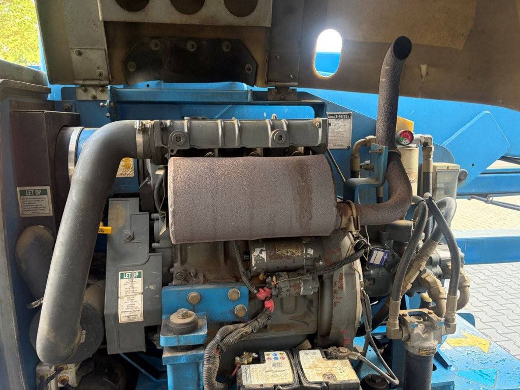 Articulating boom lift Genie Z-45/25J Diesel 15.8m 1999