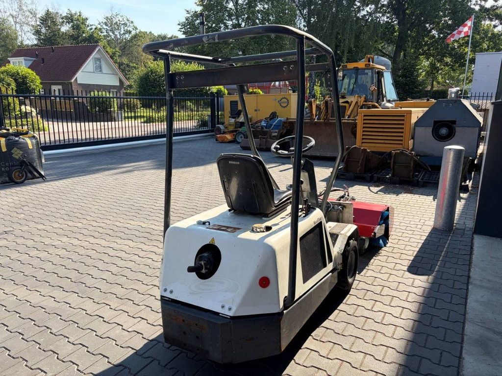 Weedtrac Diesel implement carrier with various attachments