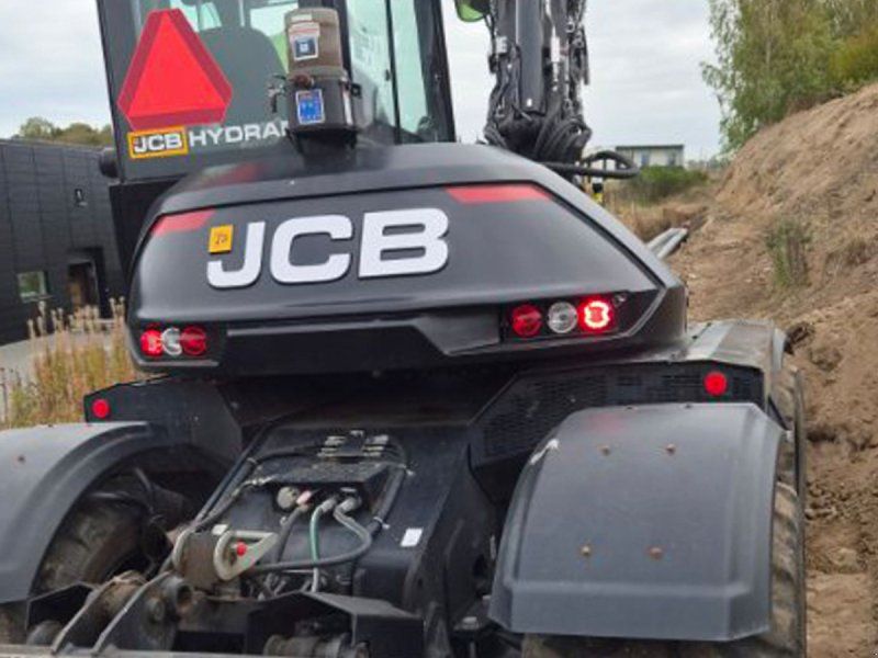 JCB Hydradig 110W Engcon Rotortilt Centralsmøring Auktion & Salg