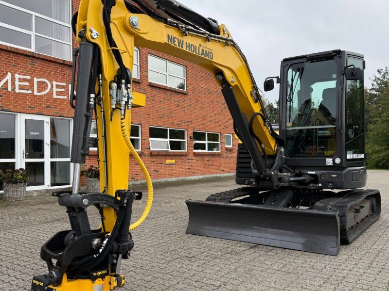 New Holland E60D + Engcon EC206