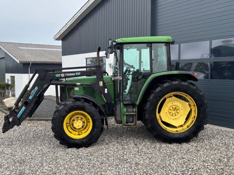John Deere 6400 SE med frontlæsser