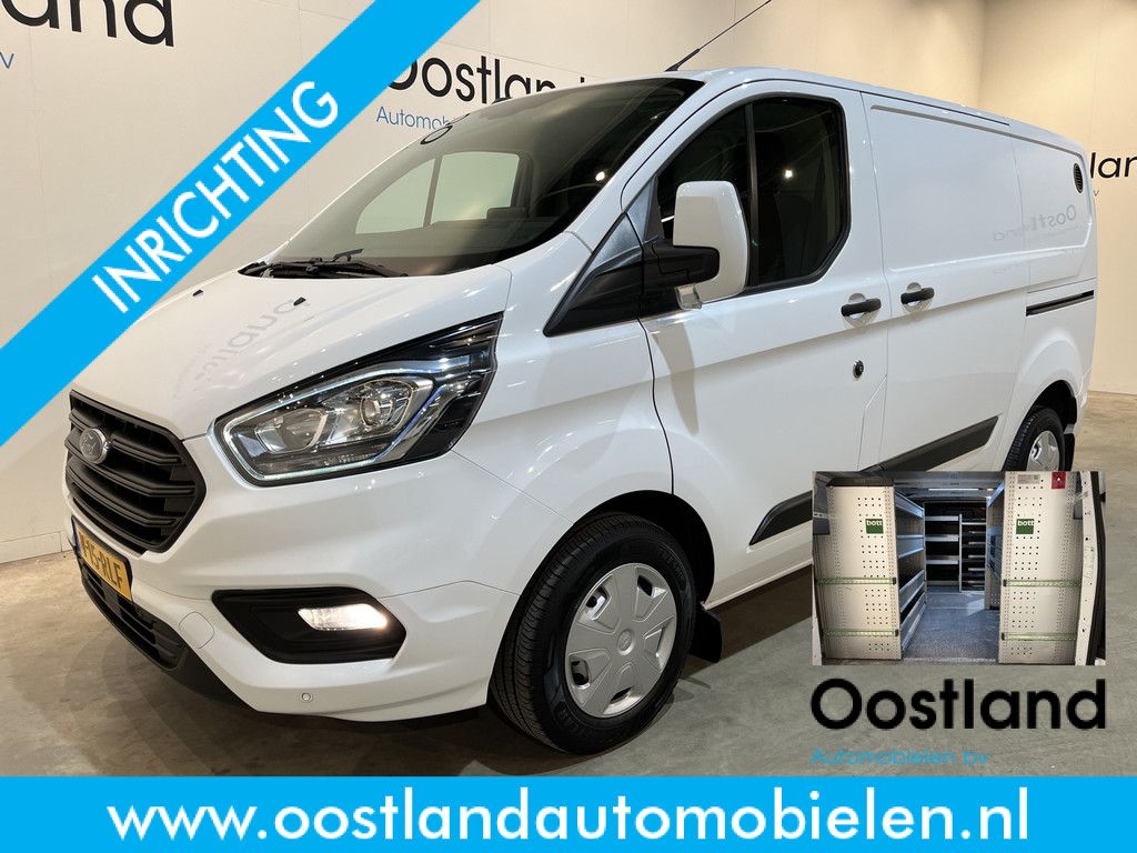 Ford Transit Custom 2.0 TDCI L1H1 Trend 130 PK / Servicebus / Bott Inrichting / Euro 6 / Schuifdeur L+R / Airco / CarPlay / Cruise Control / Camera / Navigatie / Klep / 3-Zits