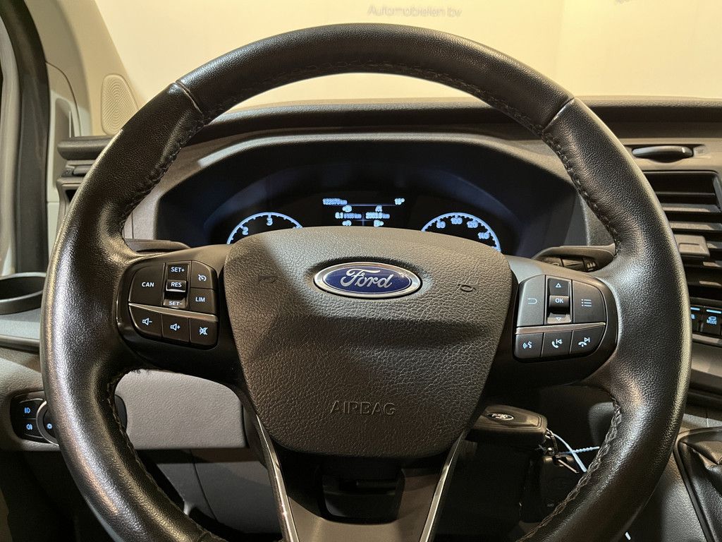 Ford Transit Custom 2.0 TDCI L1H1 Trend 130 PK / Servicebus / Bott Inrichting / Euro 6 / Schuifdeur L+R / Airco / CarPlay / Cruise Control / Camera / Navigatie / Klep / 3-Zits