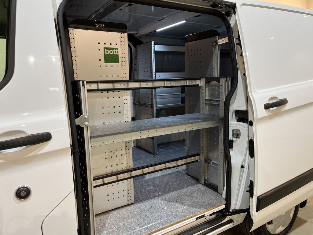 Ford Transit Custom 2.0 TDCI L1H1 Trend 130 PK / Servicebus / Bott Inrichting / Euro 6 / Schuifdeur L+R / Airco / CarPlay / Cruise Control / Camera / Navigatie / Klep / 3-Zits
