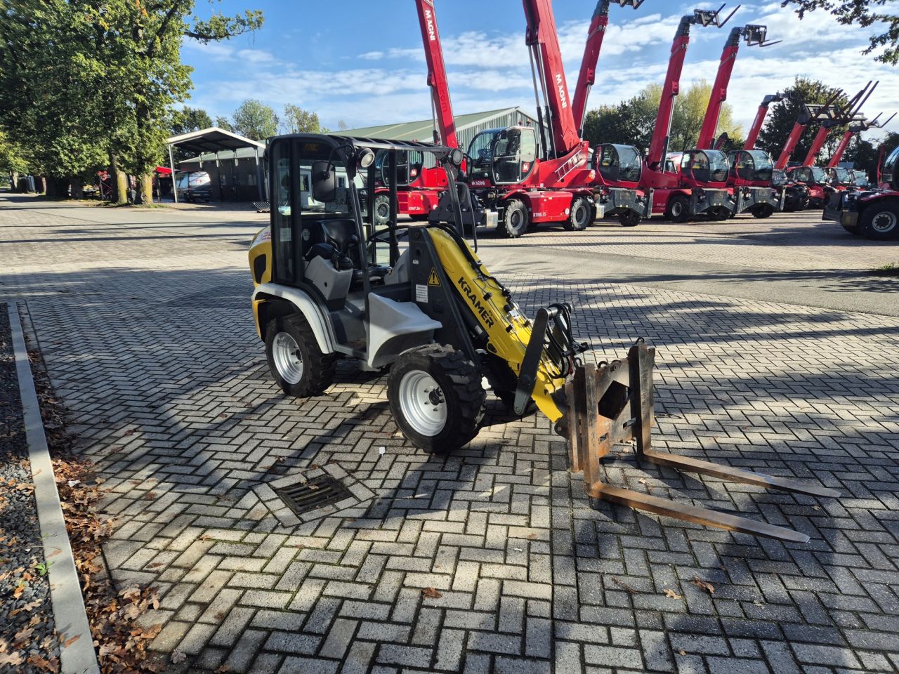 KRAMER 5025 minishovel met 4-wiel besturing