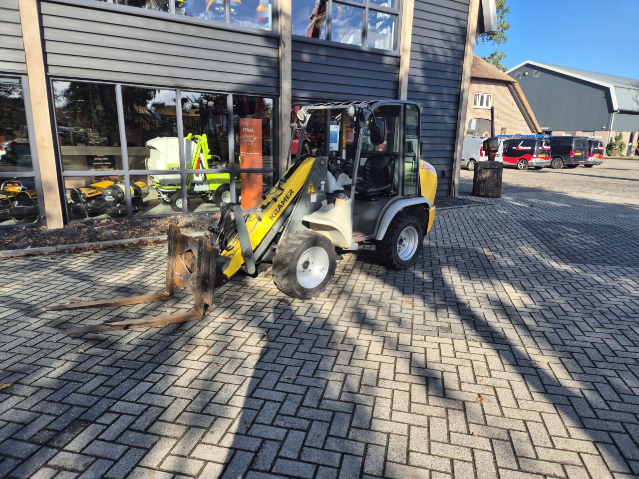 KRAMER 5025 minishovel met 4-wiel besturing