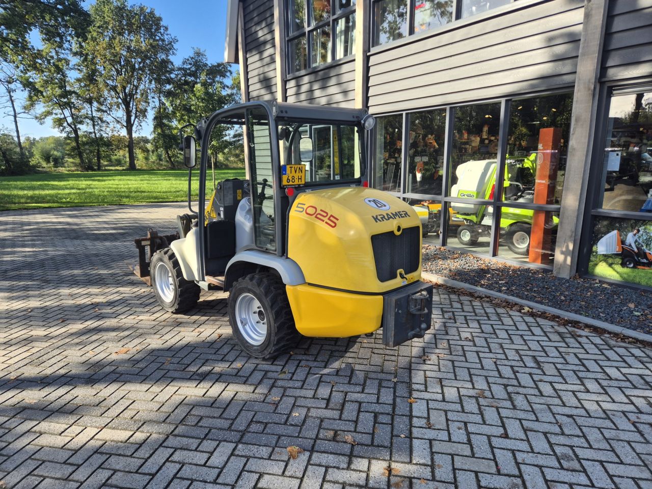 KRAMER 5025 minishovel met 4-wiel besturing