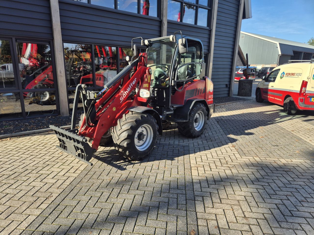 Gebruikte SCHÄFFER 4670 wiellader met gewicht van 3150 kgs