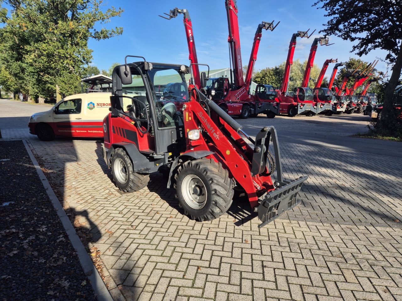 Gebruikte SCHÄFFER 4670 wiellader met gewicht van 3150 kgs