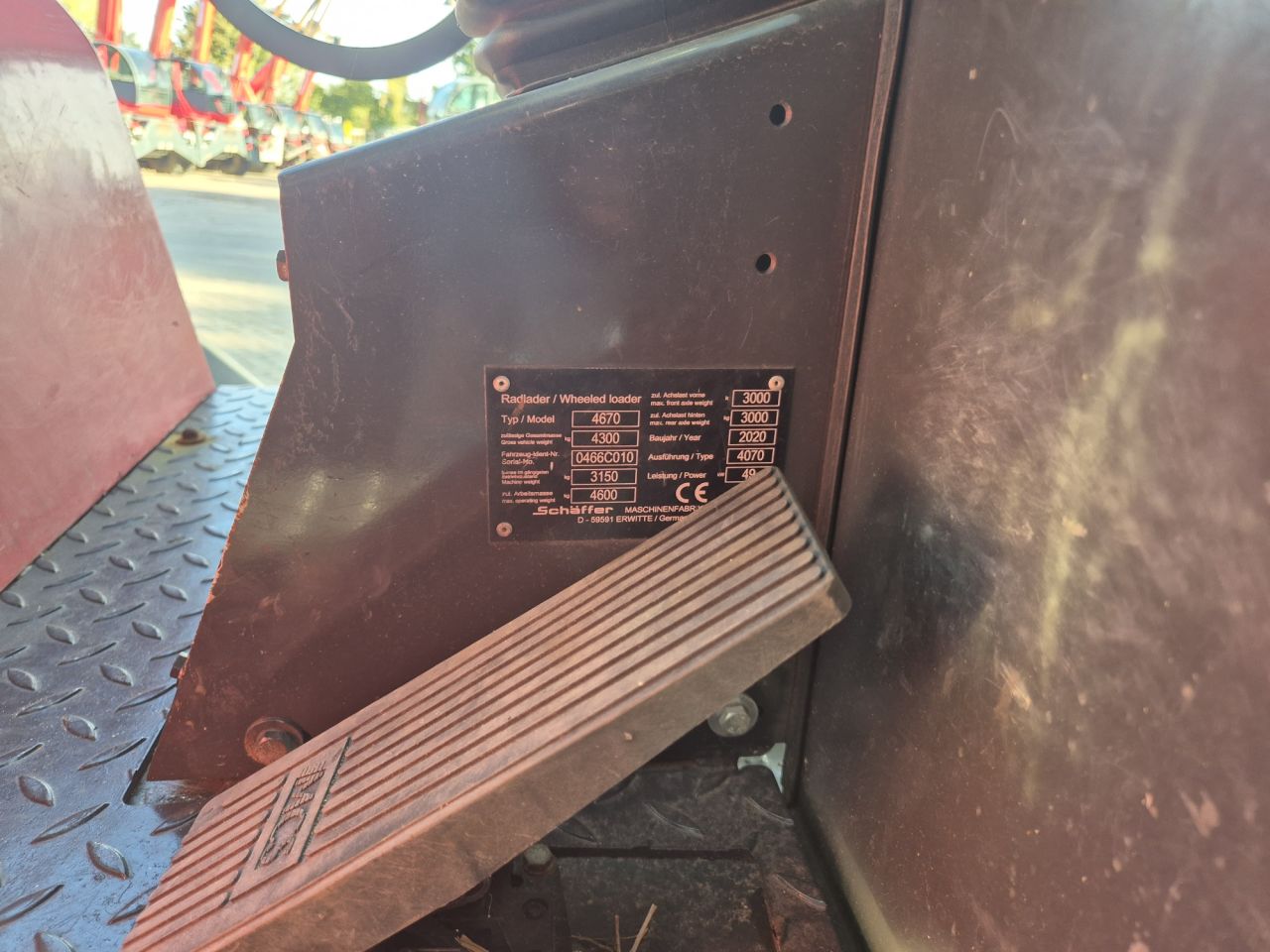 Gebruikte SCHÄFFER 4670 wiellader met gewicht van 3150 kgs
