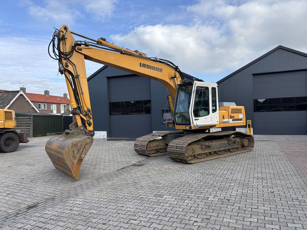 Liebherr R904 HDSL Litronic. Hydr-Snelwissel met Bak.