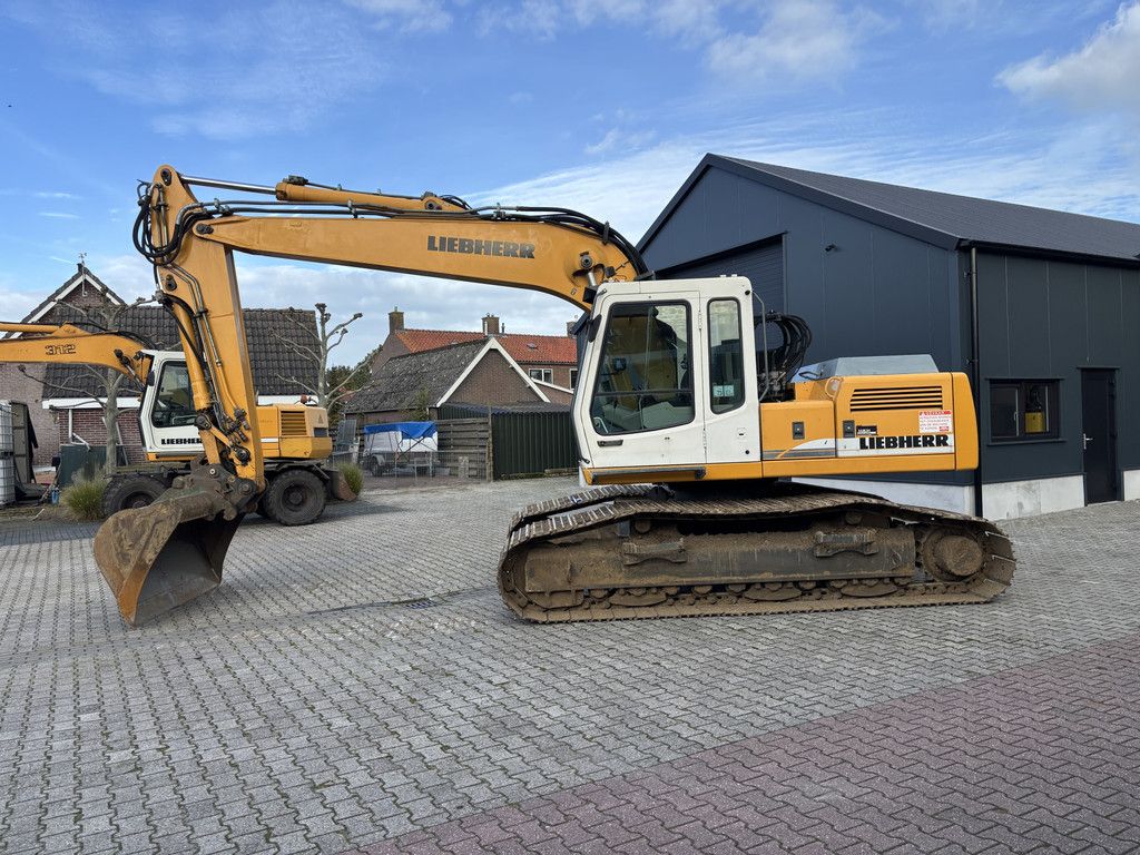 Liebherr R904 HDSL Litronic. Hydr-Snelwissel met Bak.