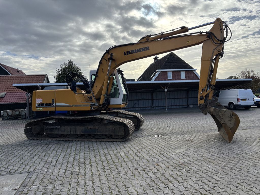 Liebherr R904 HDSL Litronic. Hydr-Snelwissel met Bak.