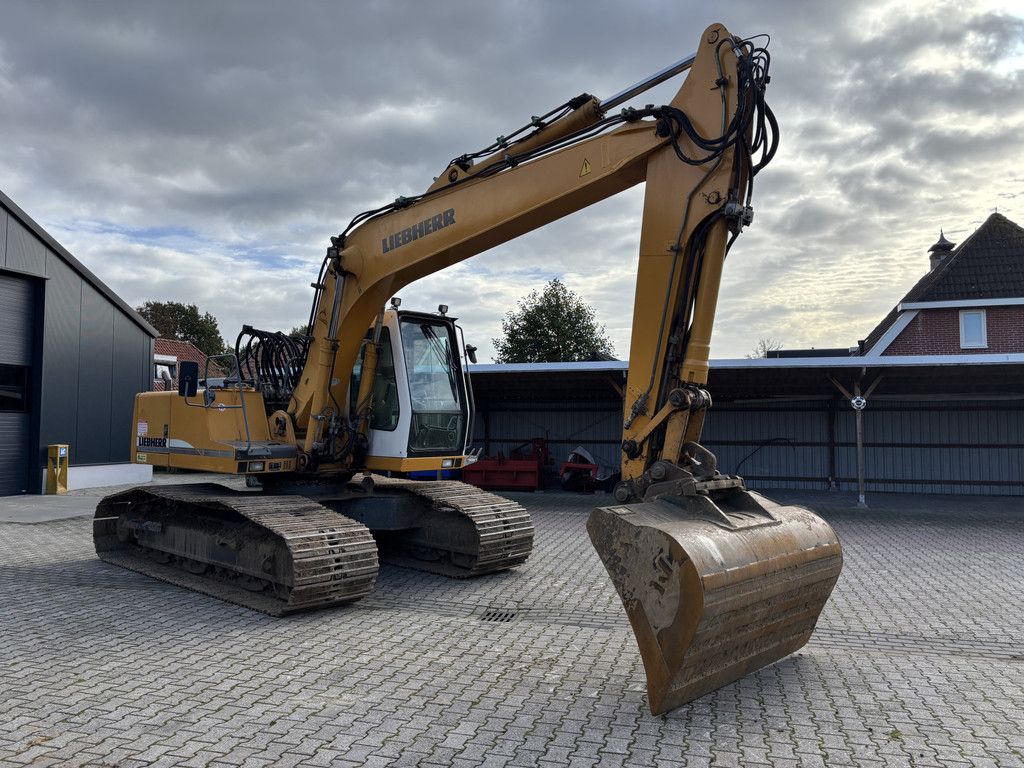 Liebherr R904 HDSL Litronic. Hydr-Snelwissel met Bak.