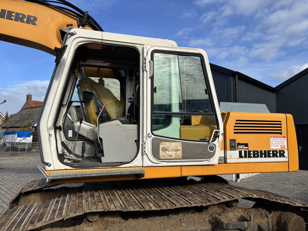 Liebherr R904 HDSL Litronic. Hydr-Snelwissel met Bak.