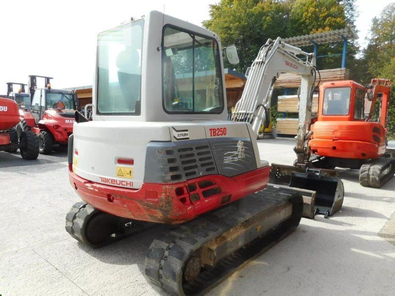 Takeuchi tb 250 ( 4.965kg ) powertilt hydr. sw 3 löffel